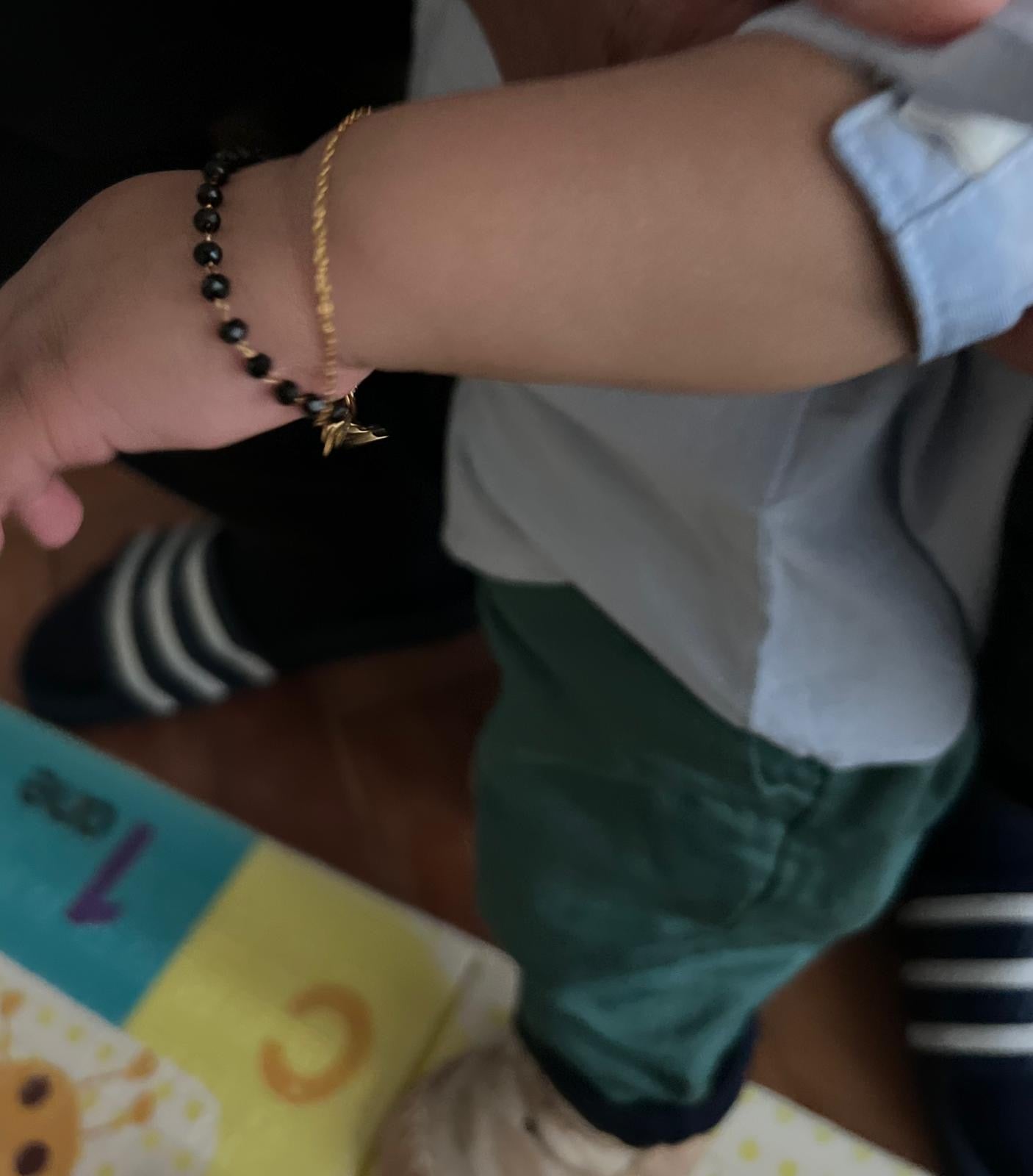 PAIR OF BLACK AND GOLD BEAD BABY BRACELETS