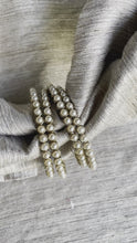 Load and play video in Gallery viewer, Pearl-Studded Gold Bangle Set | Indian Bangles
